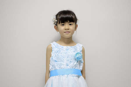 Japanese girl in a dress (7 years old)の写真素材