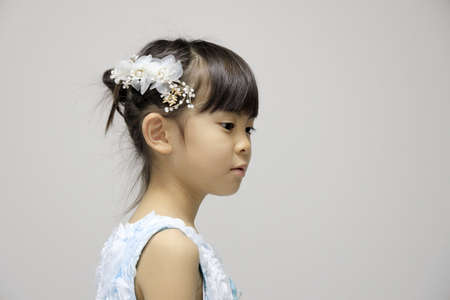 Japanese girl in a dress (profile) (7 years old)の写真素材