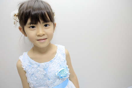 Japanese girl in a dress (7 years old)の写真素材