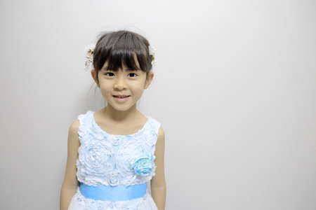 Japanese girl in a dress (7 years old)の写真素材