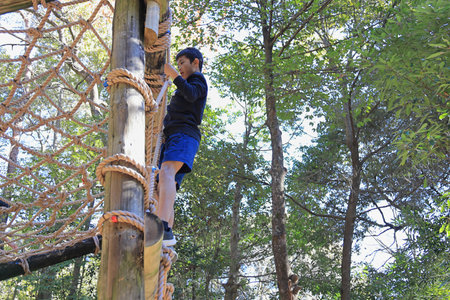 Japanese junior high school student playing with rope walking (13 years old)の写真素材