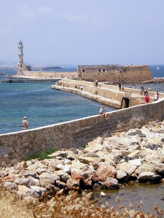 Chania port entrance with lighthouse, on Creta island, Greeceの写真素材
