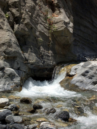 waterfall in the canyon of a greek islandの写真素材