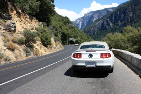 luxury sport car on a road in Yosemite park, Californiaのeditorial素材