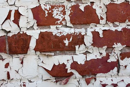 grunge background of old red brick wall painted white の写真素材