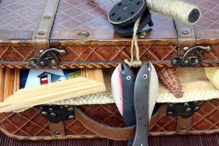 suitcase full of summer objects