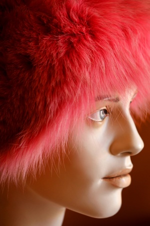 Pink fur hat on mannequin headの写真素材