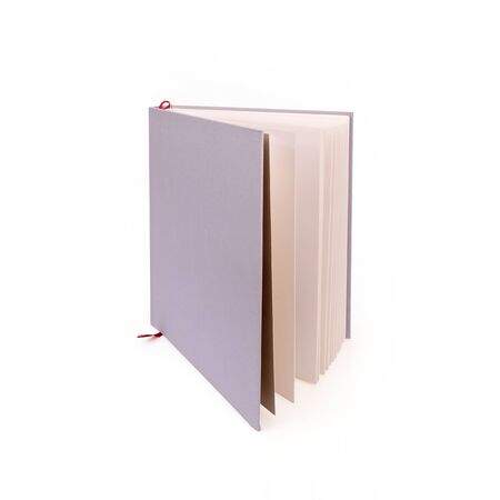 Book in color cover with white sheets isolated on a white backgroundの写真素材