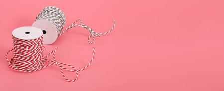 Mockup: Christmas composition with ropes isolated on a pink background