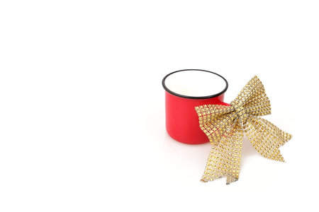Mockup: Christmas composition with a red mug isolated on a white background