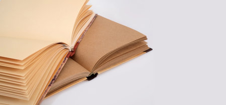 Notebook with blank sheets of craft paper isolated on white background