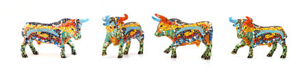 Souvenir mosaic figures of a bull in Spain isolated on white backgroundの写真素材