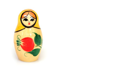 Traditional Russian wooden toy "Matryoshka" isolated on white backgroundの写真素材