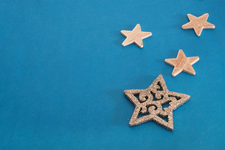 Traditional christmas blue background with silver stars for greeting lettering or announcement