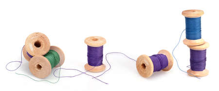 Spool of thread isolated on white backgroundの写真素材