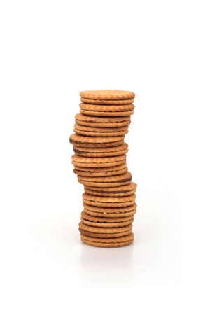 Round biscuits with chocolate filling isolated on a white backgroundの写真素材