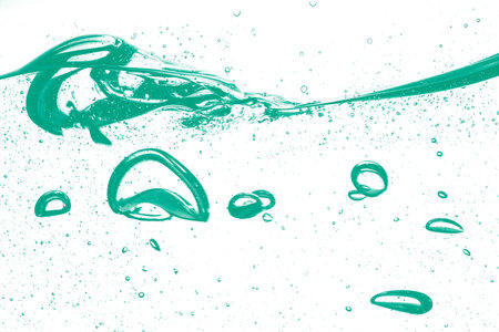 Beautiful fast-flowing liquid background with bubbles (isolated mockup)