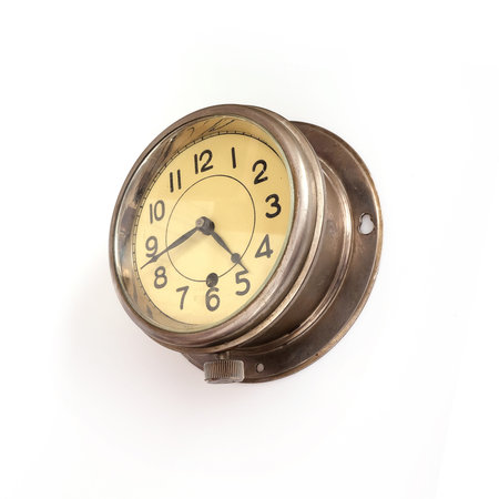 Vintage ship clock isolated on white background