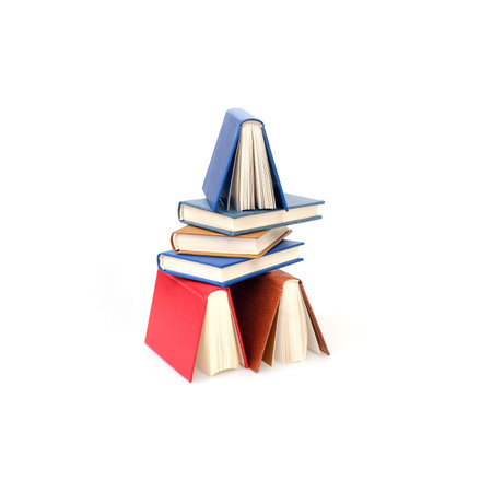 Stack of books in color covers with white sheets isolated on a white backgroundの写真素材