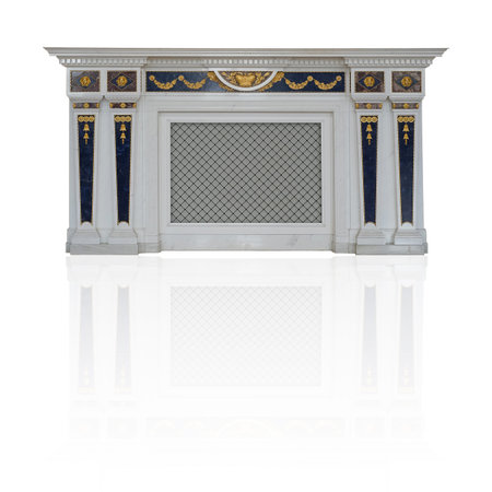 Marble fireplace with gold decorations isolated on white backgroundの写真素材