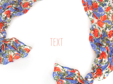 Beautiful scarf with a flower pattern isolated on a white background for framing labels,...