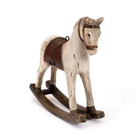 Old fashioned horse-chairs isolated on a white backgroundの写真素材