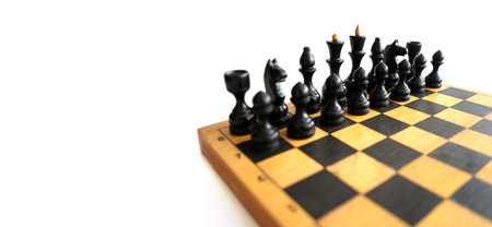 Chess on a wooden board isolated on a white background