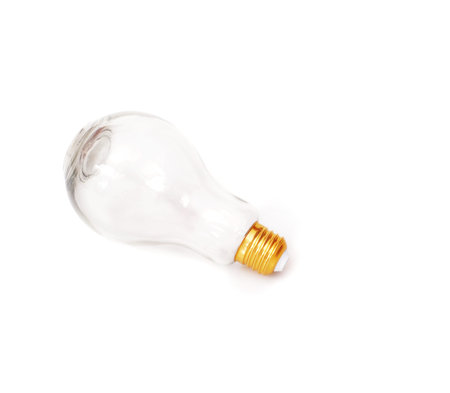 Glass vase in the form of a light bulb isolated on white backgroundの写真素材