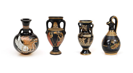 Souvenir from Greece in the form of a vases isolated on a white background with a mythological figuresの写真素材