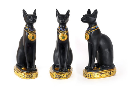 Souvenir from Egypt (goddess Bastet in the form of a black cat) isolated on white backgroundの写真素材