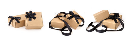 Set of craft boxes with black bow and ribbon isolated on white background