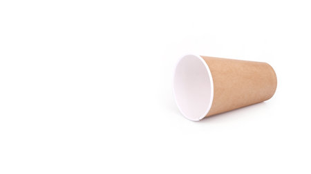 Craft brown paper cup isolated on white background.の写真素材