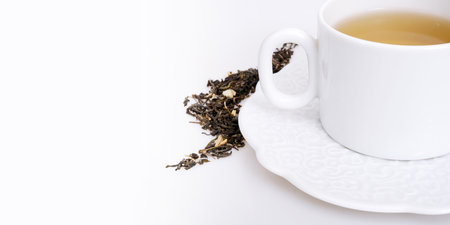 Porcelain cup with tea on white background.の写真素材