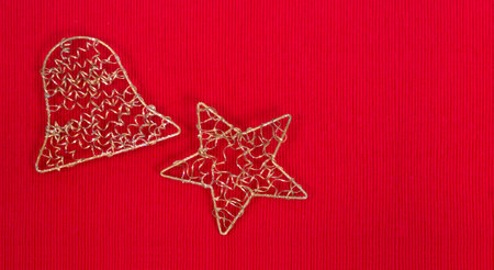 Templates for Christmas banner with star and bell on a red backgroundの写真素材