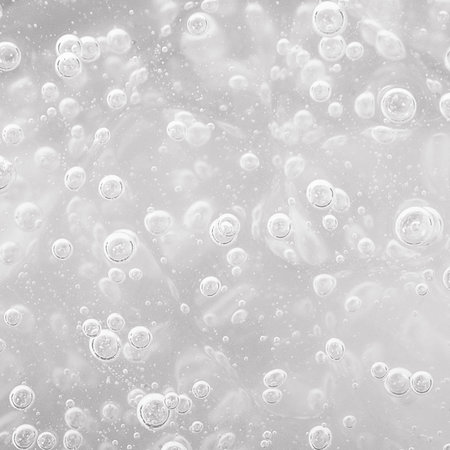 Mockup of natural background: Isolated beautiful liquid with bubblesの写真素材