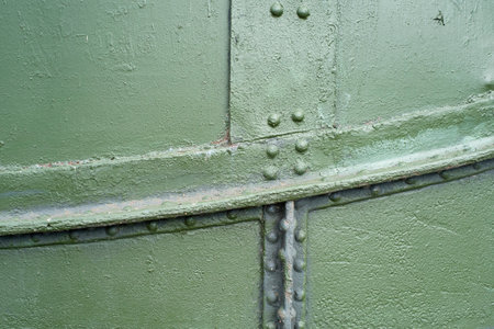 Old metal surface (isolated green background)の写真素材