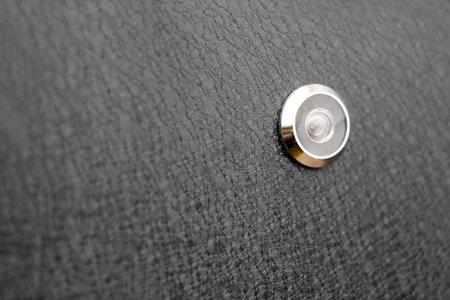 Isolated input metal door and peephole: background and textureの写真素材