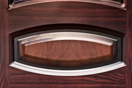 Metal entrance door part: Texture of a metal surfaceの写真素材