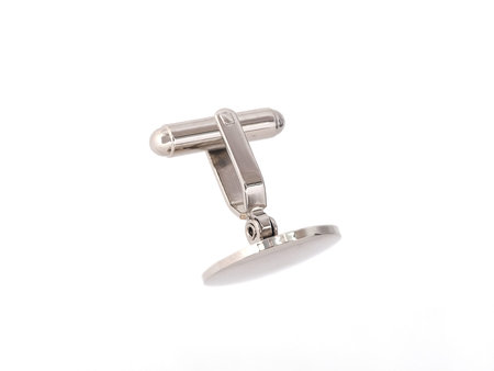 Dress shirt cufflink isolated on a white background