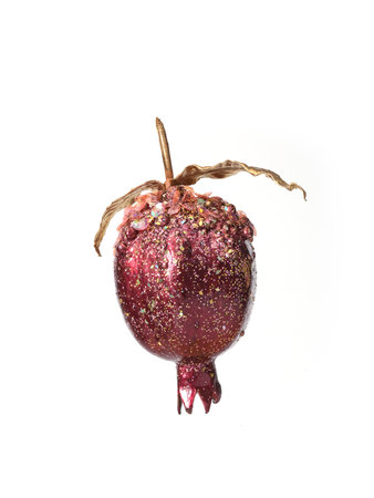 Red Pomegranate decorations for the Christmas tree isolated on a white backgroundの写真素材