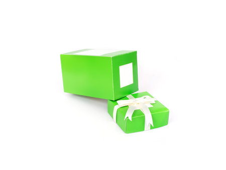 Green gift box isolated on a white backgroundの写真素材
