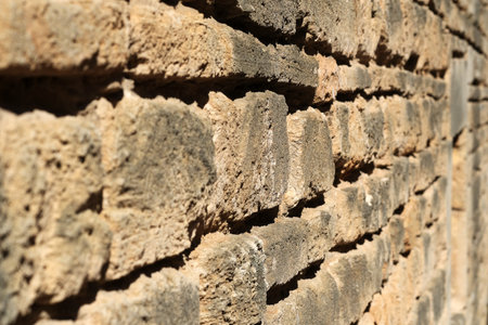 Isolated old brick wall for creating a design backgroundの写真素材