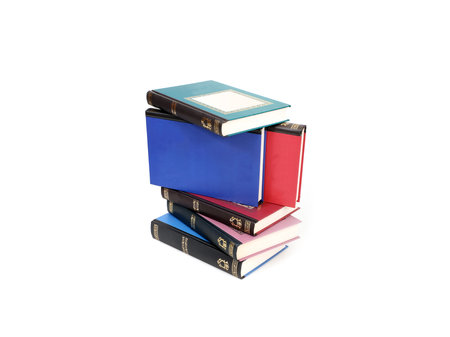 Stack of books in color covers with white sheets isolated on a white backgroundの写真素材