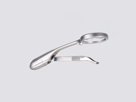 Silver magnifying glass (loupe) with tweeters on a white background