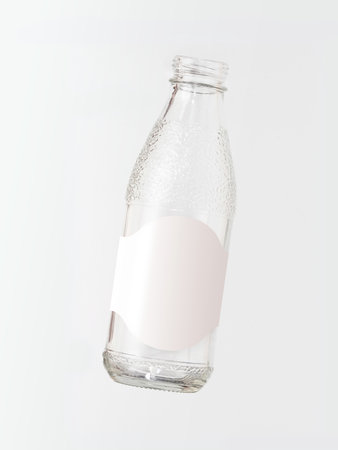 Empty glass bottle mockup isolated on a white background. Design element with clipping pathの写真素材