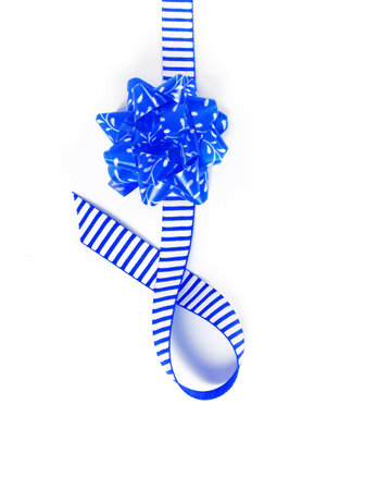 Layout greeting card with blue bow for a card or poster with a blank place for inscriptionの写真素材