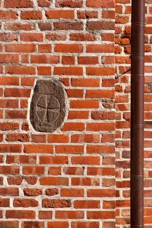 Gothic brick wall. Isolated background. Tartu, Estonia. St. John's Churchの写真素材