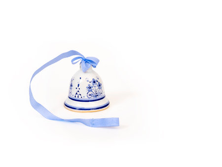 Christmas ceramic bell (or ball) isolated on a white background. Design element with clipping pathの写真素材