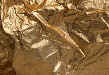 Isolated background: mockup of golden crumpled foil