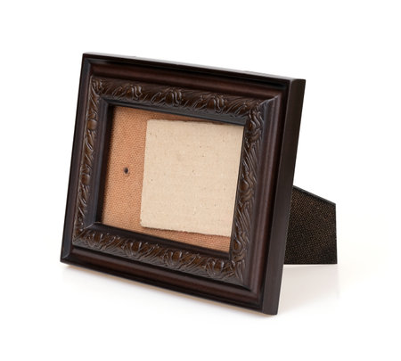 Wooden frame for paintings, mirrors or photo in perspective view isolated on white backgroundの写真素材